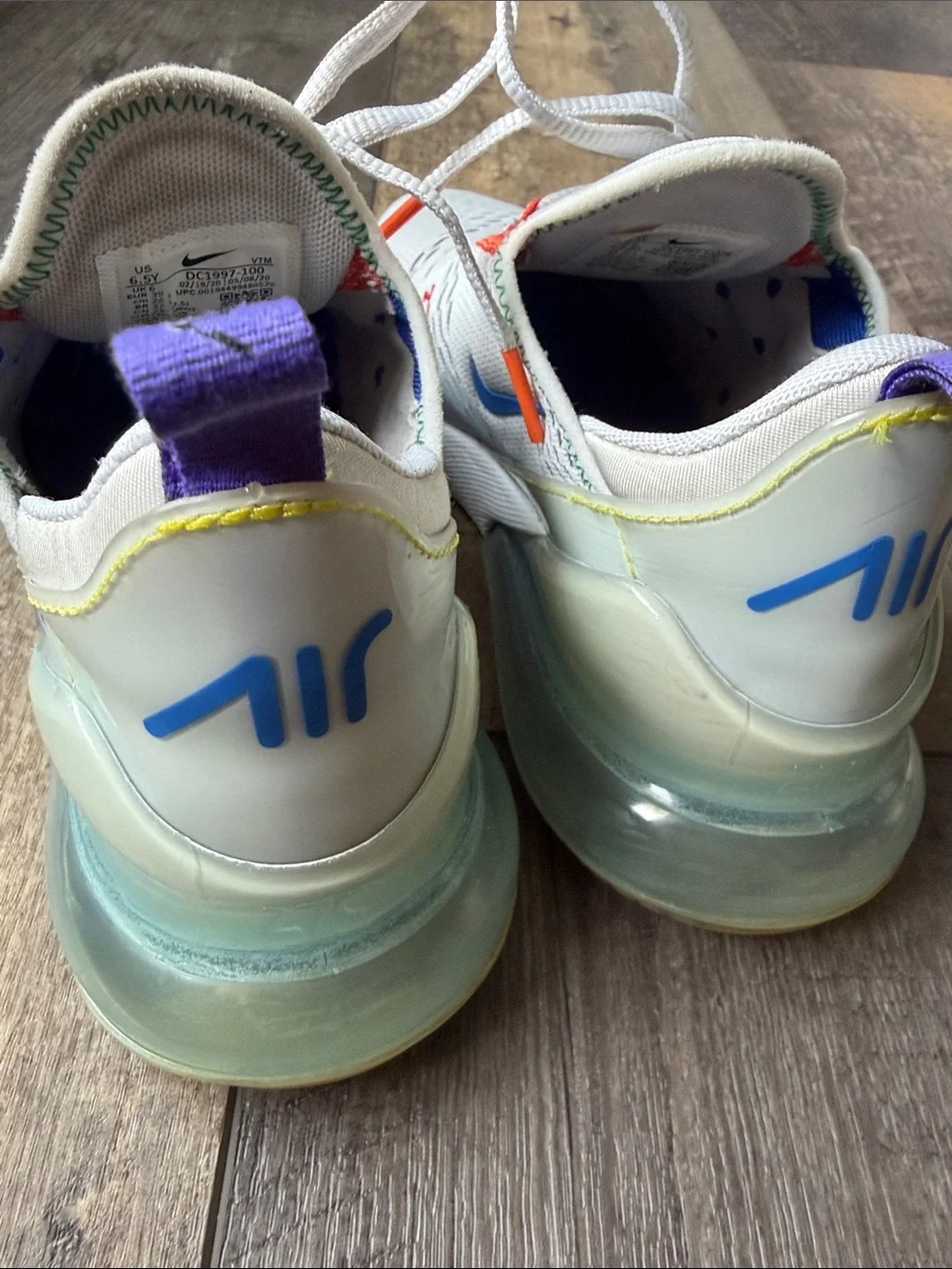 Nike Kids White Sneakers with Multicolor Accents